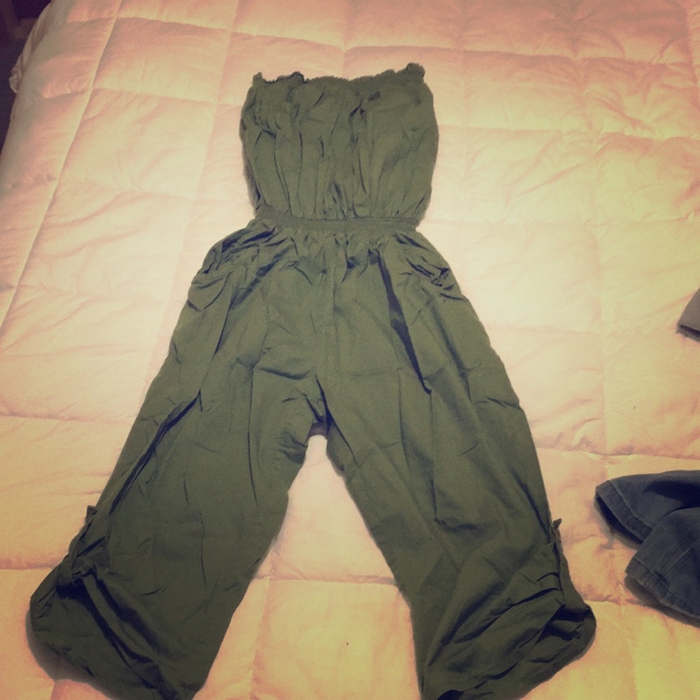 Green jumpsuit.